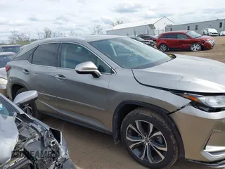 2022 Lexus RX 350 with VIN 2T2HZMAA6NC238967, listed as a IAAI auction lot 42053898 with 62,737 mi miles and . Bid and sale history available at DreamBid. Image 13.