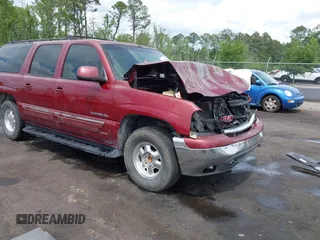 2002 GMC Yukon XL SLT z VIN 1GKEC16Z12J237879, wystawiony jako IAAI lot #42224932 z przebiegiem 302 925 mil mil oraz . Historia ofert i sprzedaży dostępna na DreamBid. Obrazek 1.