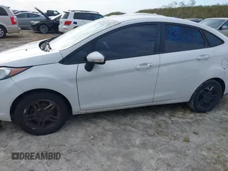 2017 Ford Fiesta SE with VIN 3FADP4BJXHM167605, listed as a IAAI auction lot 40510179 with 76,091 mi miles and . Bid and sale history available at DreamBid. Image 6.