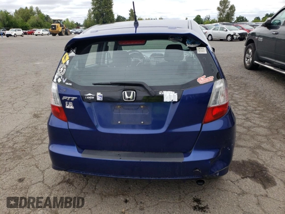 2009 Honda Fit Sport z VIN JHMGE88419S039797, wystawiony jako Copart lot #56866245 z przebiegiem 162 896 mil mil oraz Szkoda całkowita • Salvage title. Historia ofert i sprzedaży dostępna na DreamBid. Obrazek 6.
