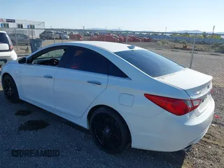 2013 Hyundai Sonata Limited with VIN 5NPEC4AB4DH759523, listed as a IAAI auction lot 42011928 with 190,419 mi miles and . Bid and sale history available at DreamBid. Image 3.