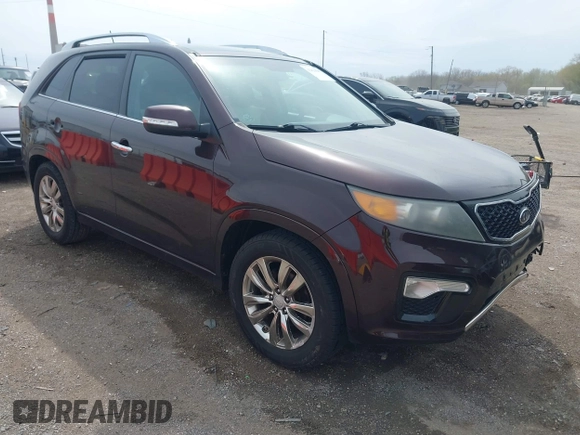 2012 Kia Sorento SX with VIN 5XYKW4A2XCG187647, listed as a IAAI auction lot 42020667 with 210,689 mi miles. Bid and sale history available at carsss.com. Image 1.