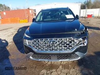 2022 Hyundai Santa Fe SEL with VIN 5NMS24AJXNH375497, listed as a IAAI auction lot 41390349 with 77,067 mi miles and . Bid and sale history available at DreamBid. Image 6.
