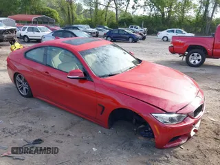 2014 BMW 4 Series 428i with VIN WBA3N3C51EF710517, listed as a IAAI auction lot 39263305 with 145,193 mi miles and . Bid and sale history available at DreamBid. Image 1.
