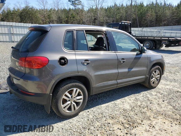 2014 Volkswagen Tiguan SE with VIN WVGAV3AX8EW619044, listed as a Copart auction lot 46990185 with 171,972 mi miles and Salvage title. Bid and sale history available at DreamBid. Image 3.