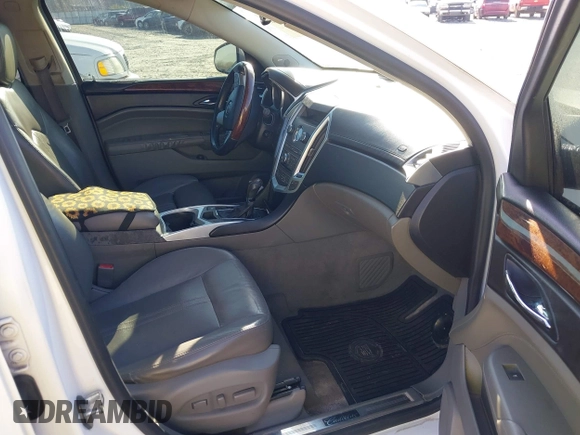 2010 Cadillac SRX Performance Collection with VIN 3GYFNBEY5AS643583, listed as a IAAI auction lot 41638630 with 137,431 mi miles and . Bid and sale history available at DreamBid. Image 5.