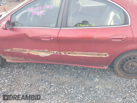 1998 Mercury Sable GS with VIN 1MEFM50U9WA605604, listed as a IAAI auction lot 41809408 with 142,175 mi miles and . Bid and sale history available at DreamBid. Image 6.