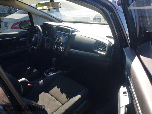 2015 Honda Fit LX with VIN 3HGGK5H56FM706547, listed as a IAAI auction lot 41745026 with 252,238 mi miles. Bid and sale history available at carsss.com. Image 5.