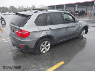 2009 BMW X5 30i with VIN 5UXFE43579L271366, listed as a IAAI auction lot 41831724 with 129,107 mi miles. Bid and sale history available at carsss.com. Image 4.