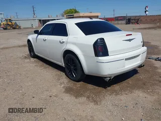 2009 Chrysler 300 Touring with VIN 2C3KA53V89H634048, listed as a IAAI auction lot 41974629 with Not Provided miles and . Bid and sale history available at DreamBid. Image 3.