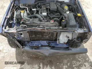 1997 Jeep Cherokee SE with VIN 1J4FT27P0VL612859, listed as a Copart auction lot 49869915 with 198,702 mi miles and Salvage title. Bid and sale history available at DreamBid. Image 12.