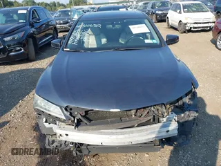 2015 Acura TLX with VIN 19UUB1F31FA023293, listed as a IAAI auction lot 40310652 with 117,350 mi miles. Bid and sale history available at carsss.com. Image 12.