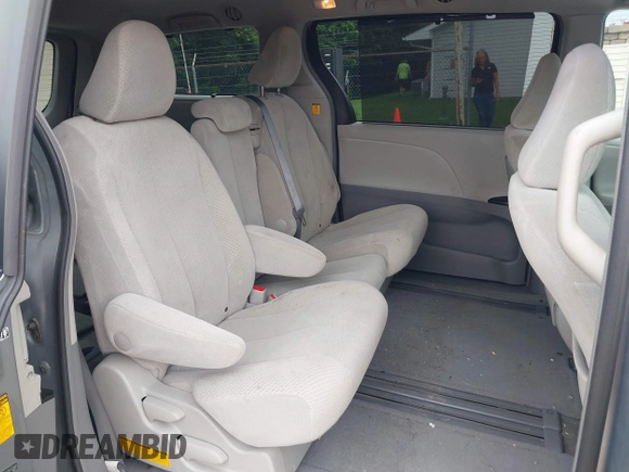 2013 Toyota Sienna LE AAS with VIN 5TDKK3DC7DS332092, listed as a IAAI auction lot 42676665 with 121,481 mi miles and . Bid and sale history available at DreamBid. Image 8.