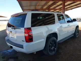 2012 Chevrolet Suburban LT with VIN 1GNSCJE05CR318556, listed as a IAAI auction lot 41654002 with 222,329 mi miles. Bid and sale history available at carsss.com. Image 4.