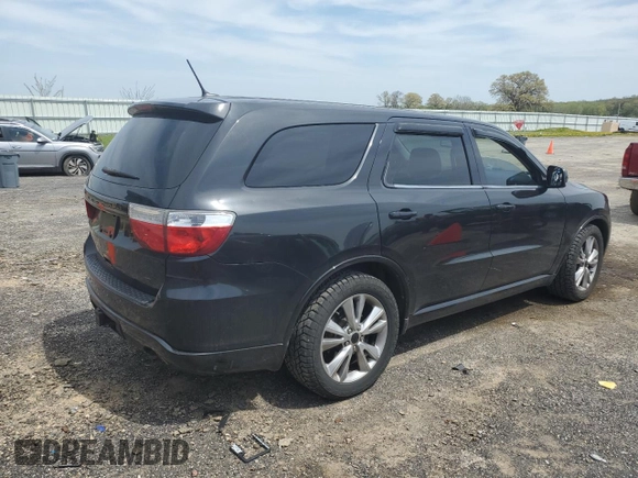2012 Dodge Durango R/T with VIN 1C4SDJCT8CC301577, listed as a Copart auction lot 55934735 with 127,691 mi miles and Salvage title. Bid and sale history available at DreamBid. Image 3.
