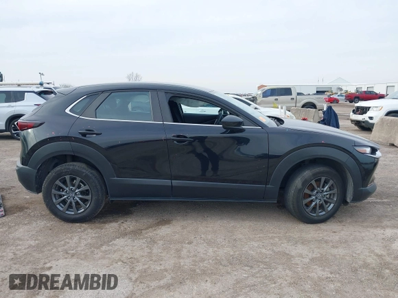 2021 Mazda CX-30 2.5 S with VIN 3MVDMAAL2MM303321, listed as a IAAI auction lot 41583346 with 57,122 mi miles. Bid and sale history available at carsss.com. Image 13.