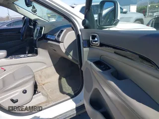 2012 Jeep Grand Cherokee Laredo with VIN 1C4RJFAT4CC229204, listed as a IAAI auction lot 41659491 with 141,143 mi miles. Bid and sale history available at carsss.com. Image 5.
