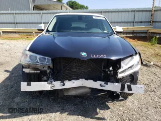 2015 BMW X4 xDrive28i with VIN 5UXXW3C57F0M88277, listed as a Copart auction lot 61388634 with 110,962 mi miles and Salvage title. Bid and sale history available at DreamBid. Image 5.