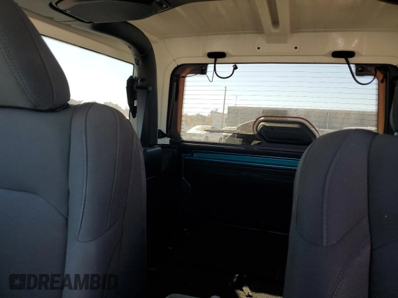 2020 Jeep Wrangler Sport with VIN 1C4GJXAG4LW178754, listed as a Copart auction lot 77232714 with 108,955 mi miles and Salvage title. Bid and sale history available at DreamBid. Image 10.