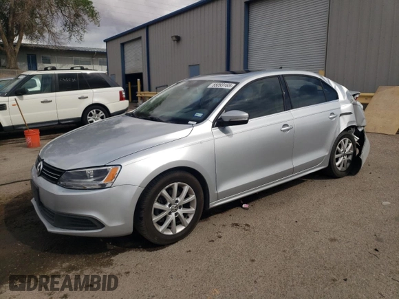2014 Volkswagen Jetta SE with VIN 3VWD07AJ4EM427734, listed as a Copart auction lot 55093165 with 117,260 mi miles and Salvage title. Bid and sale history available at DreamBid. Image 1.