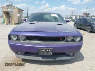 2014 Dodge Challenger R/T z VIN 2C3CDYBT0EH143576, wystawiony jako IAAI lot #42333984 z przebiegiem 189 874 mil mil oraz . Historia ofert i sprzedaży dostępna na DreamBid. Obrazek 12.