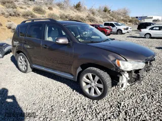 2010 Mitsubishi Outlander XLS with VIN JA4JT4AX8AZ006392, listed as a Copart auction lot 50663555 with 104,172 mi miles and Salvage Title. Bid and sale history available at carsss.com. Image 4.