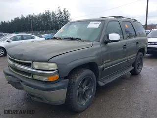 2001 Chevrolet Tahoe LS with VIN 1GNEK13T21J286934, listed as a IAAI auction lot 41850005 with 147,542 mi miles. Bid and sale history available at carsss.com. Image 2.