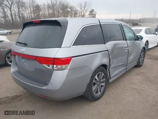 2016 Honda Odyssey Touring Elite with VIN 5FNRL5H96GB062318, listed as a IAAI auction lot 41660493 with 137,269 mi miles. Bid and sale history available at carsss.com. Image 4.