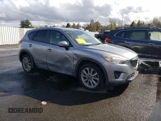 2015 Mazda CX-5 Grand Touring with VIN JM3KE2DY5F0507904, listed as a Copart auction lot 50542895 with 160,736 mi miles and Salvage Title. Bid and sale history available at carsss.com. Image 4.
