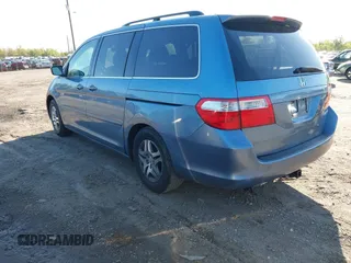 2005 Honda Odyssey EX-L with VIN 5FNRL38605B037065, listed as a IAAI auction lot 42042666 with 228,908 mi miles. Bid and sale history available at carsss.com. Image 3.