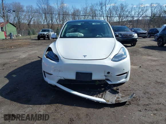 2021 Tesla Model Y Long Range with VIN 5YJYGDEE9MF239726, listed as a IAAI auction lot 41952158 with 37,088 mi miles and . Bid and sale history available at DreamBid. Image 6.