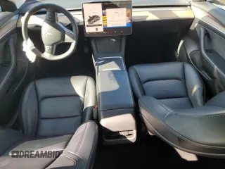 2023 Tesla Model 3 with VIN 5YJ3E1EA7PF456613, listed as a Copart auction lot 56940255 with 35,920 mi miles and Non repairable. Bid and sale history available at DreamBid. Image 8.