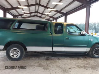 1999 Ford F-150 with VIN 2FTRX17L9XCA19030, listed as a IAAI auction lot 41232157 with Not provided miles and . Bid and sale history available at DreamBid. Image 14.