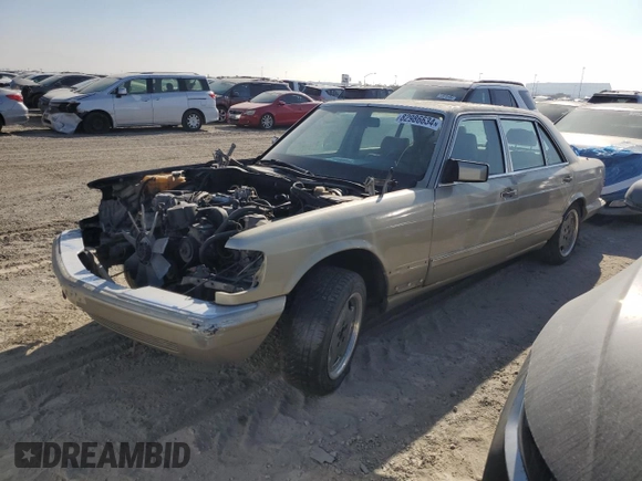 1989 Mercedes-Benz 560 with VIN WDBCA39E8KA469603, listed as a Copart auction lot 82986634 with 81,490 mi miles and Clean Title. Bid and sale history available at DreamBid. Image 1.