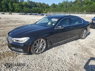 2018 BMW 7 Series 750i z VIN WBA7F0C52JGM24063, wystawiony jako Copart lot #61251915 z przebiegiem 89 955 mil mil oraz Czysty tytuł • Clean title. Historia ofert i sprzedaży dostępna na DreamBid. Obrazek 1.