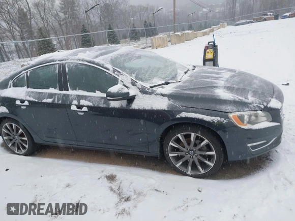 2015 Volvo S60 T5 Premier with VIN YV1612TK6F1348608, listed as a IAAI auction lot 41229153 with 73,019 mi miles. Bid and sale history available at carsss.com. Image 13.