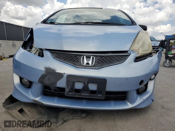 2010 Honda Fit Sport with VIN JHMGE8H64AC032634, listed as a Copart auction lot 61795825 with 143,593 mi miles and Salvage title. Bid and sale history available at DreamBid. Image 5.