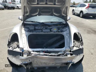 2013 Porsche Boxster z VIN WP0CA2A86DS113911, wystawiony jako Copart lot #58456454 z przebiegiem 101 149 mil mil oraz Szkoda całkowita • Salvage title. Historia ofert i sprzedaży dostępna na DreamBid. Obrazek 12.