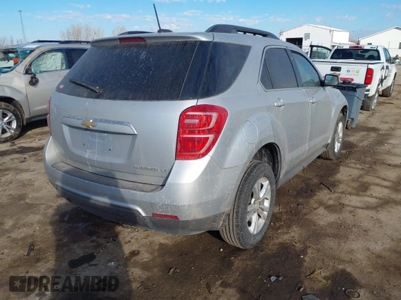 2016 Chevrolet Equinox LT with VIN 2GNALCEK5G6164747, listed as a IAAI auction lot 41684370 with 100,412 mi miles and . Bid and sale history available at DreamBid. Image 4.