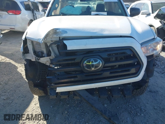 2018 Toyota Tacoma SR with VIN 5TFRX5GN9JX121099, listed as a IAAI auction lot 41186232 with 127,151 mi miles and . Bid and sale history available at DreamBid. Image 6.