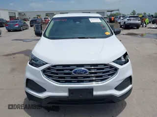 2020 Ford Edge SE z VIN 2FMPK3G90LBB05473, wystawiony jako IAAI lot #42447819 z przebiegiem 69 612 mil mil oraz . Historia ofert i sprzedaży dostępna na DreamBid. Obrazek 13.
