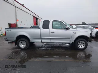 2002 Ford F-150 XL with VIN 2FTRX18W02CA59160, listed as a IAAI auction lot 41610058 with 190,608 mi miles and . Bid and sale history available at DreamBid. Image 14.