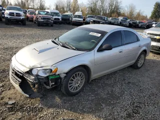 2005 Chrysler Sebring Touring with VIN 1C3EL56R25N682541, listed as a Copart auction lot 84051594 with 184,668 mi miles and Salvage Title. Bid and sale history available at DreamBid. Image 1.