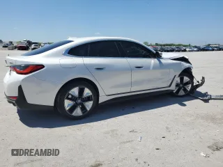 2023 BMW i4 eDrive35 with VIN WBY43AW02PFP53587, listed as a Copart auction lot 51493324 with 15,595 mi miles. Bid and sale history available at carsss.com. Image 3.