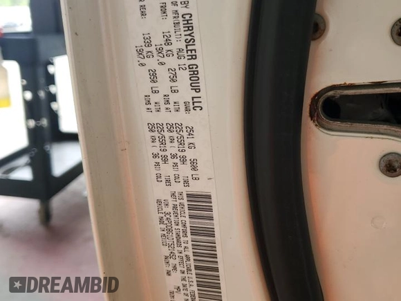 2013 Dodge Journey SXT with VIN 3C4PDDBG1DT521452, listed as a Copart auction lot 62660785 with 177,945 mi miles and Salvage title. Bid and sale history available at DreamBid. Image 13.