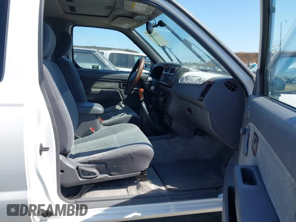 1999 Nissan Frontier XE with VIN 1N6ED26Y1XC321943, listed as a IAAI auction lot 42583401 with 65,803 mi miles and . Bid and sale history available at DreamBid. Image 5.
