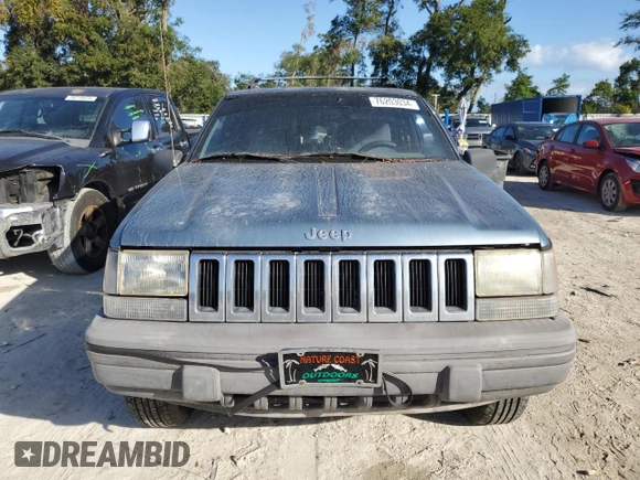 1995 Jeep Grand Cherokee Laredo with VIN 1J4FX58S4SC742471, listed as a Copart auction lot 76203034 with 206,717 mi miles and Non Repairable. Bid and sale history available at carsss.com. Image 5.