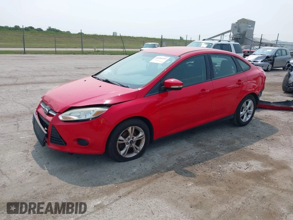 2013 Ford Focus SE z VIN 1FADP3F25DL314809, wystawiony jako IAAI lot #42399393 z przebiegiem 159 394 mil mil oraz . Historia ofert i sprzedaży dostępna na DreamBid. Obrazek 2.