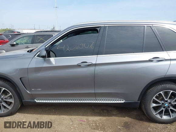 2017 BMW X5 xDrive35i with VIN 5UXKR0C33H0V81489, listed as a IAAI auction lot 42065076 with 65,900 mi miles and . Bid and sale history available at DreamBid. Image 15.
