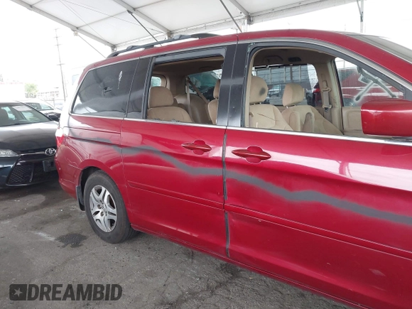 2005 Honda Odyssey EX with VIN 5FNRL38485B411954, listed as a IAAI auction lot 42039034 with 220,966 mi miles. Bid and sale history available at carsss.com. Image 6.